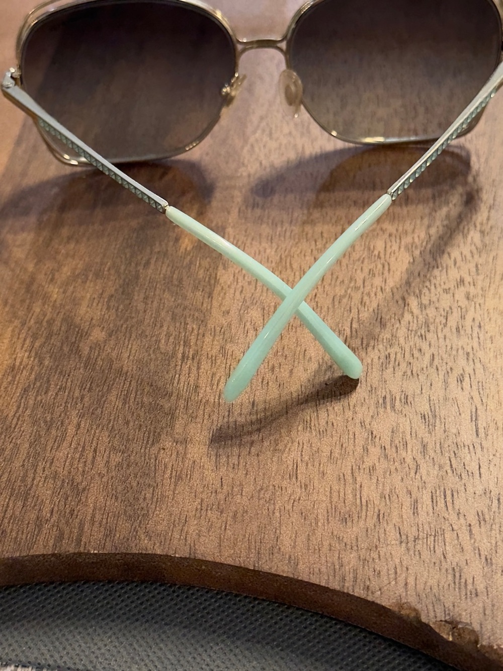 Tiffany & Co. Sunglasses with Mint Temple Tips and Gold Frames